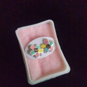 Broquel flor esmaltado plata .925