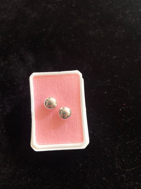 Broquel oro laminado dormilona