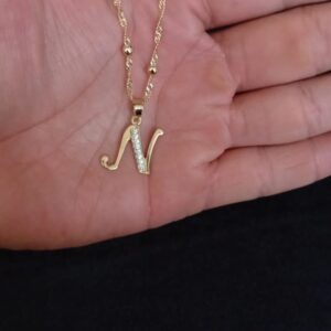 Inicial cursiva oro laminado