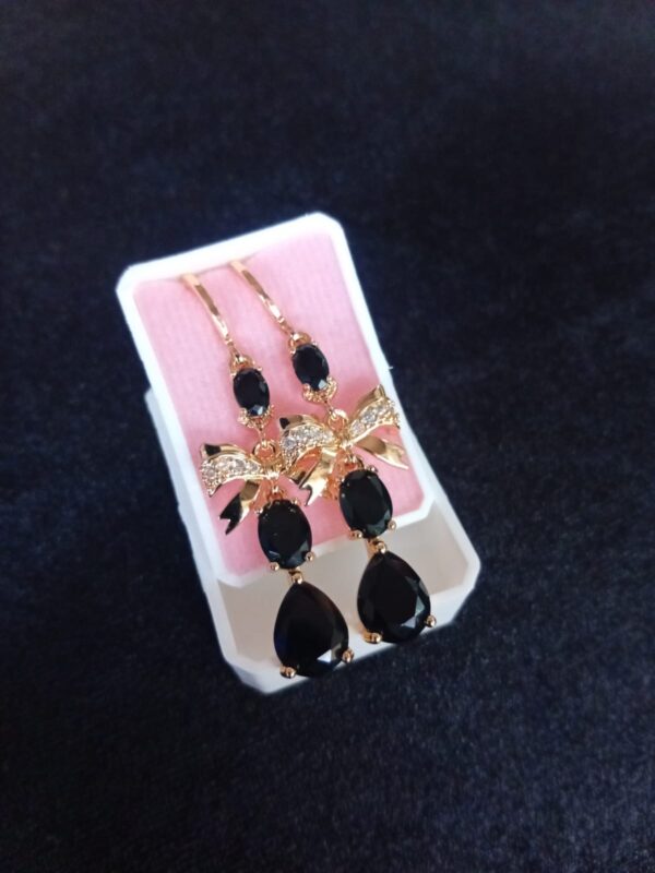 Arete largo caja oro laminado