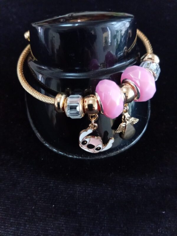 Pulsera ajustable con dijes oro laminado