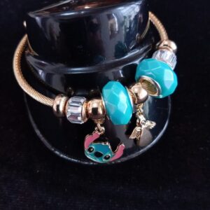 Pulsera ajustable con dijes oro laminado