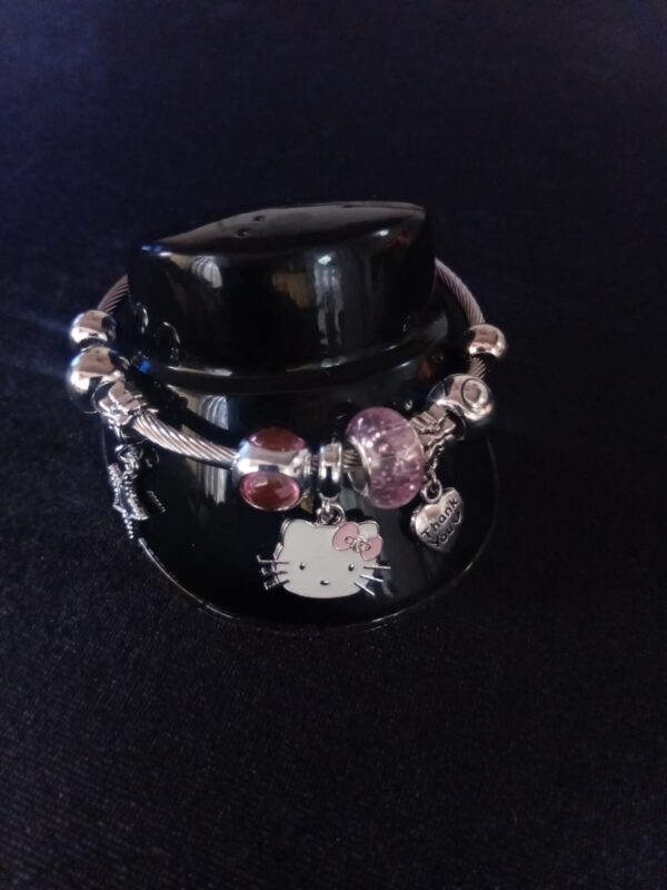 Pulsera ajustable con dijes oro laminado