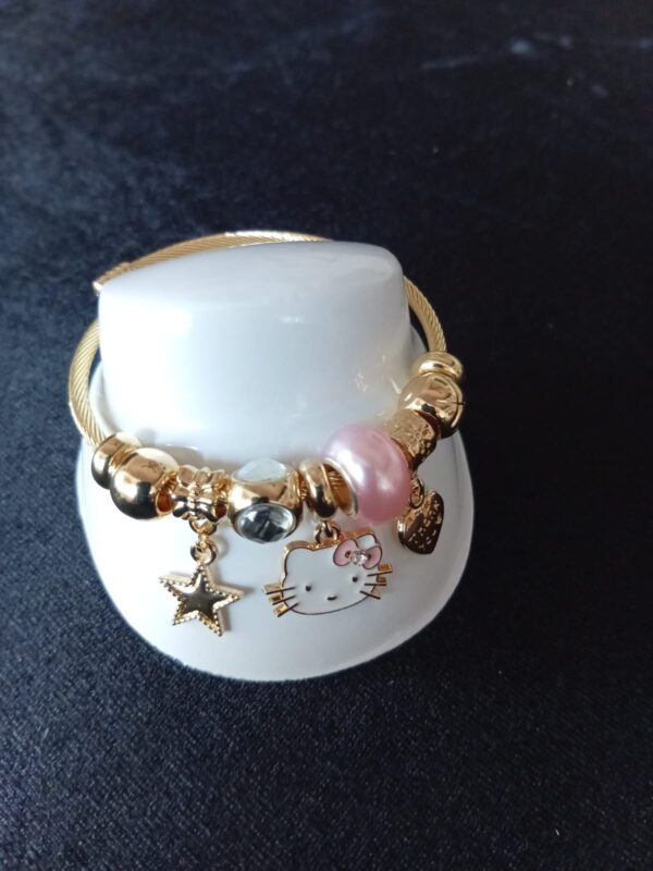Pulsera ajustable con dije oro laminado