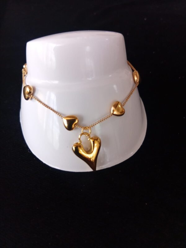 Pulsera con dije oro laminado