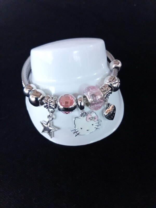 Pulsera ajustable con dijes oro laminado