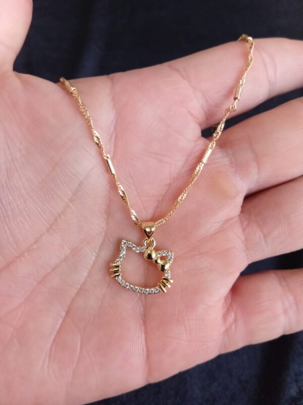 Dije mediano oro laminado
