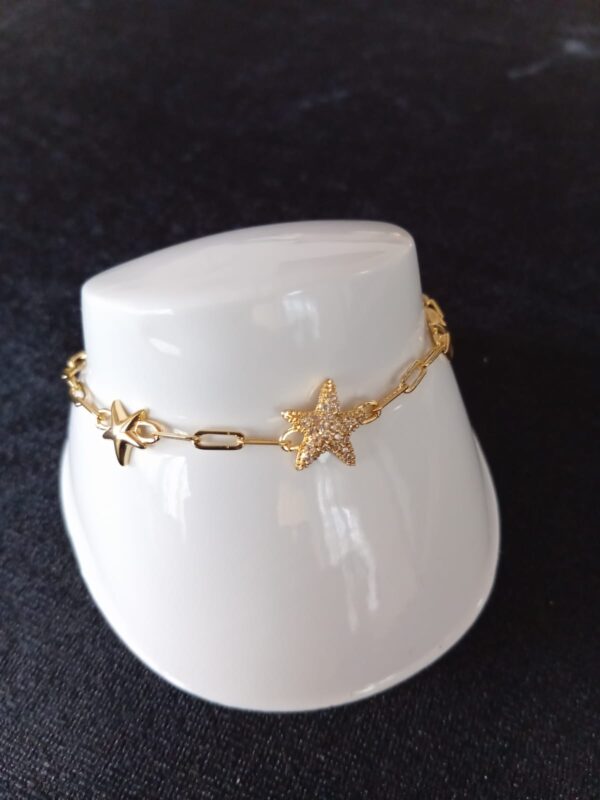 Pulsera delgada  con zirconia  oro laminado