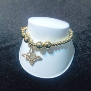 Pulsera con dije oro laminado