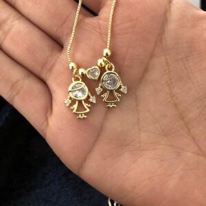 Dijes niños oro laminado