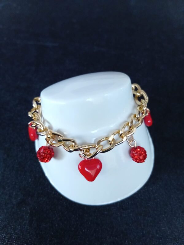 Pulsera con dijes oro laminado