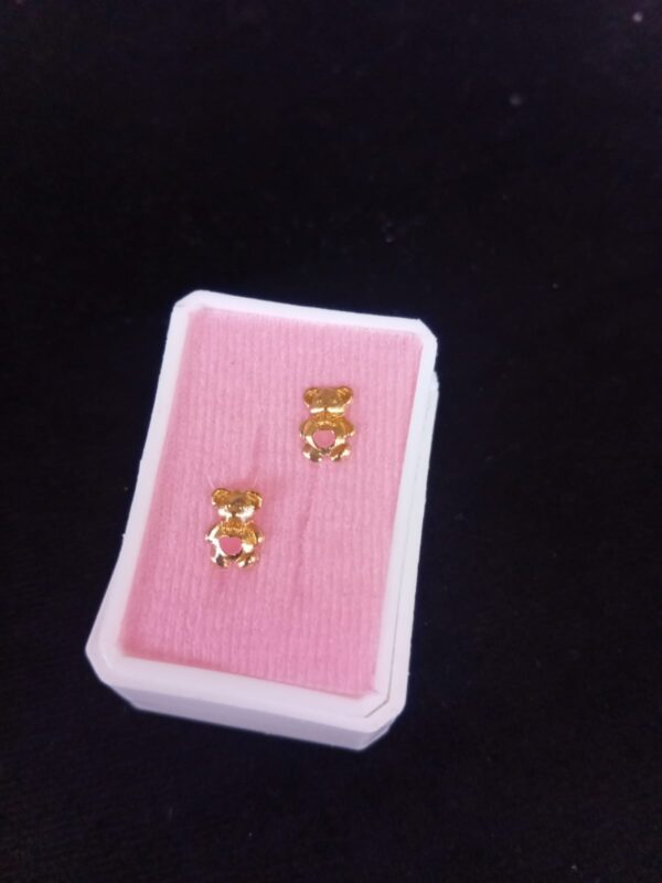 Broquel oro laminado
