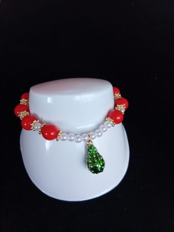 Pulsera con dijes oro laminado