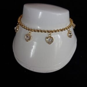 Pulsera con dijes oro laminado