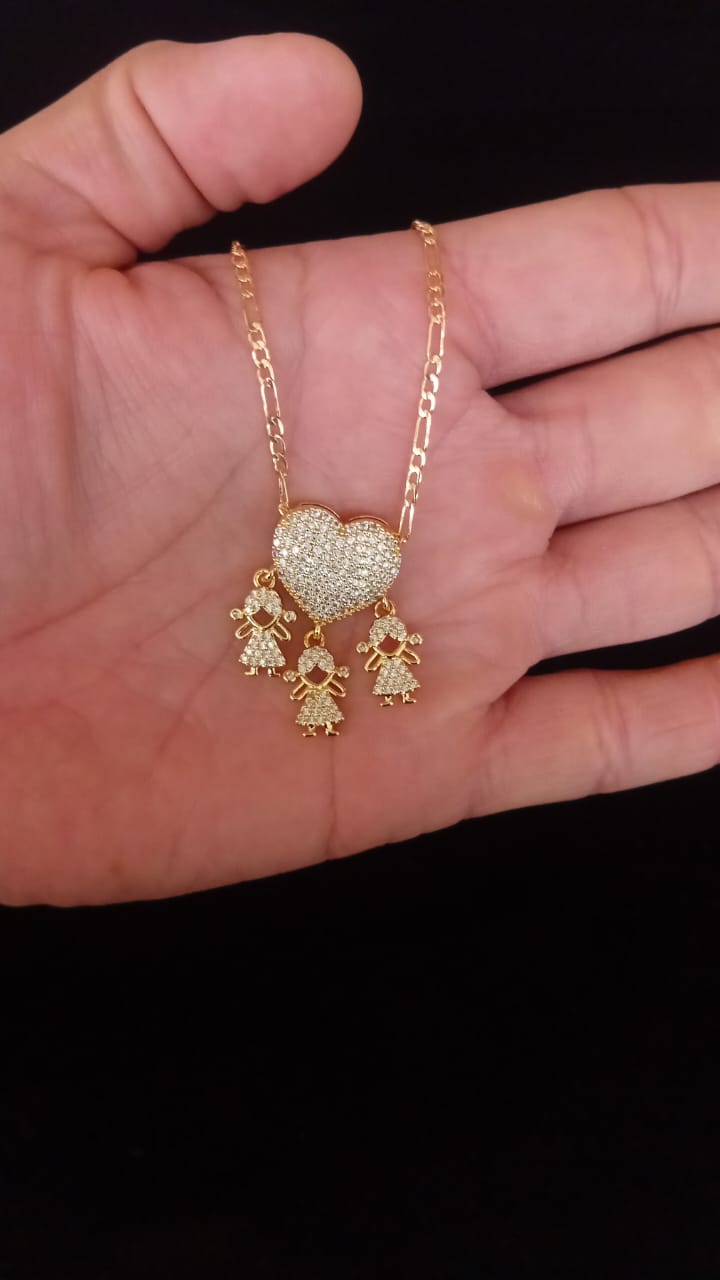 Dije niños oro laminado