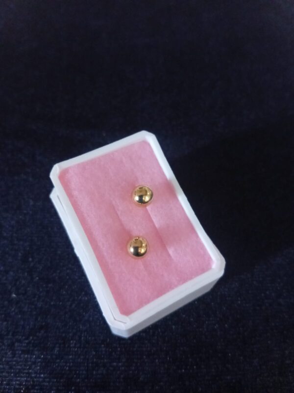 Broquel oro laminado