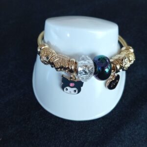 Pulsera ajustable con dijes oro laminado