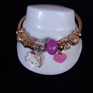 Pulsera ajustable con dijes oro laminado